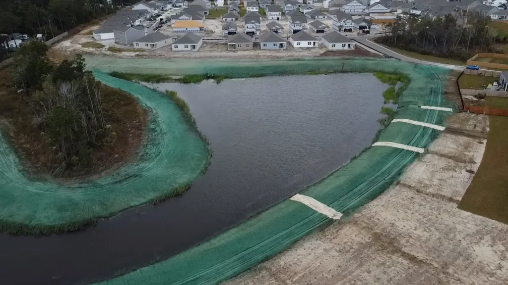 Surf City Hydroseeding with Mirimichi CarbonizPN pond bank restoration