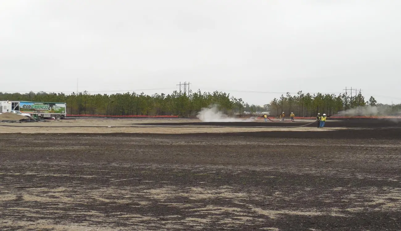 Compost Blanket and Mirimichi Green Soil Enhancer installation