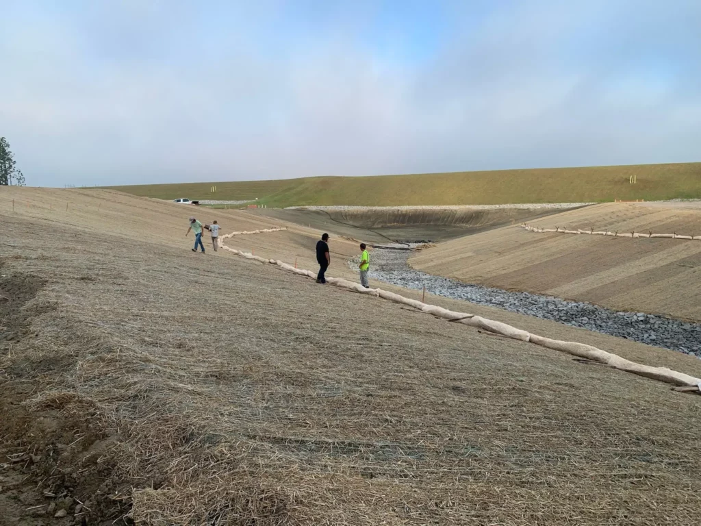 Straw wattles, straw blowing, and creating a basin