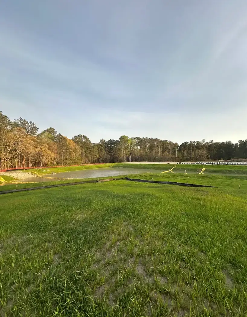 The site is now permanently stabilized with vegetation, ensuring full compliance with the land disturbance permit.