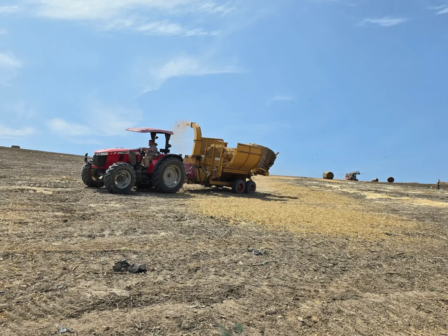 Blowing straw for stabilization and moisture retention